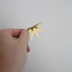 Vinilos Decorativos, Set de 12 Estrellas Medianos Dorado 091